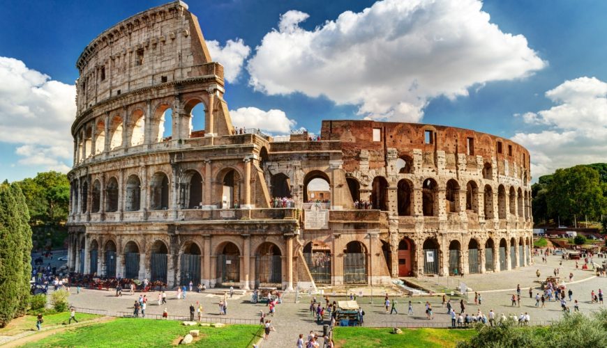 Tourists exploring the Colosseum in Rome, Italy