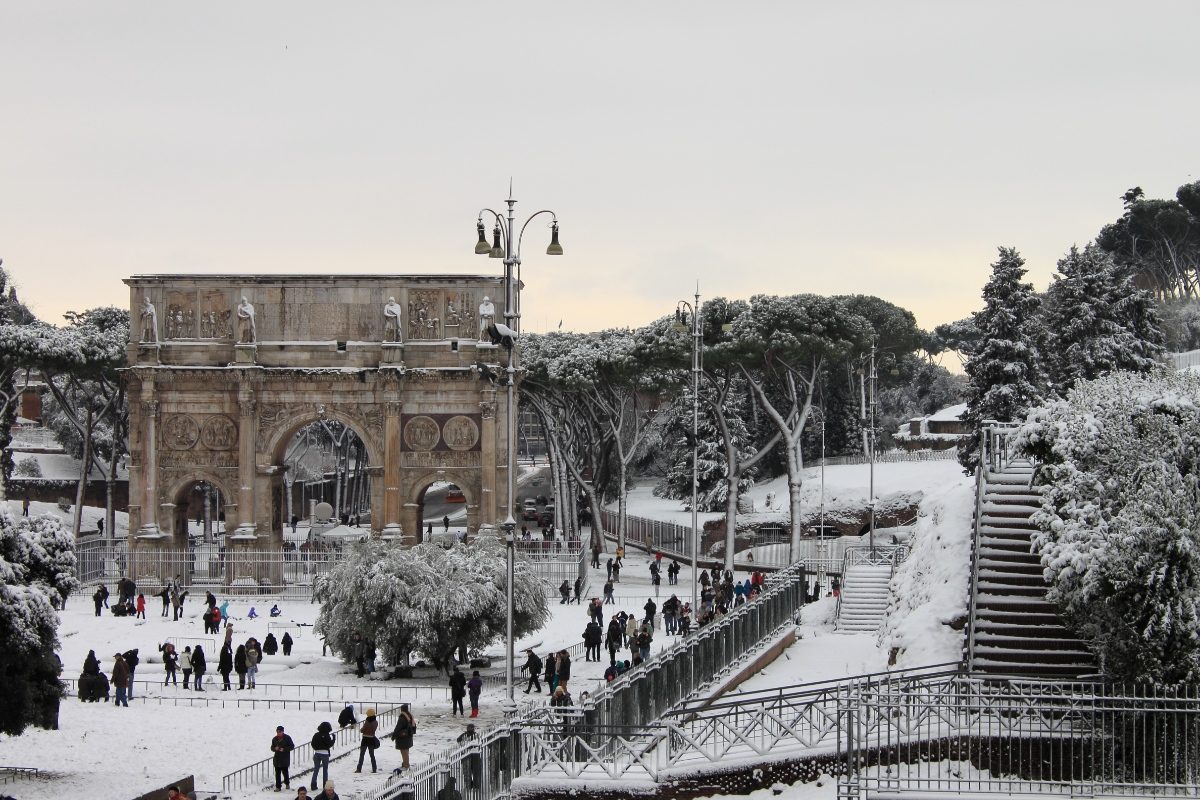 The Arch of Constantine in Rome, Italy, beautifully covered in snow