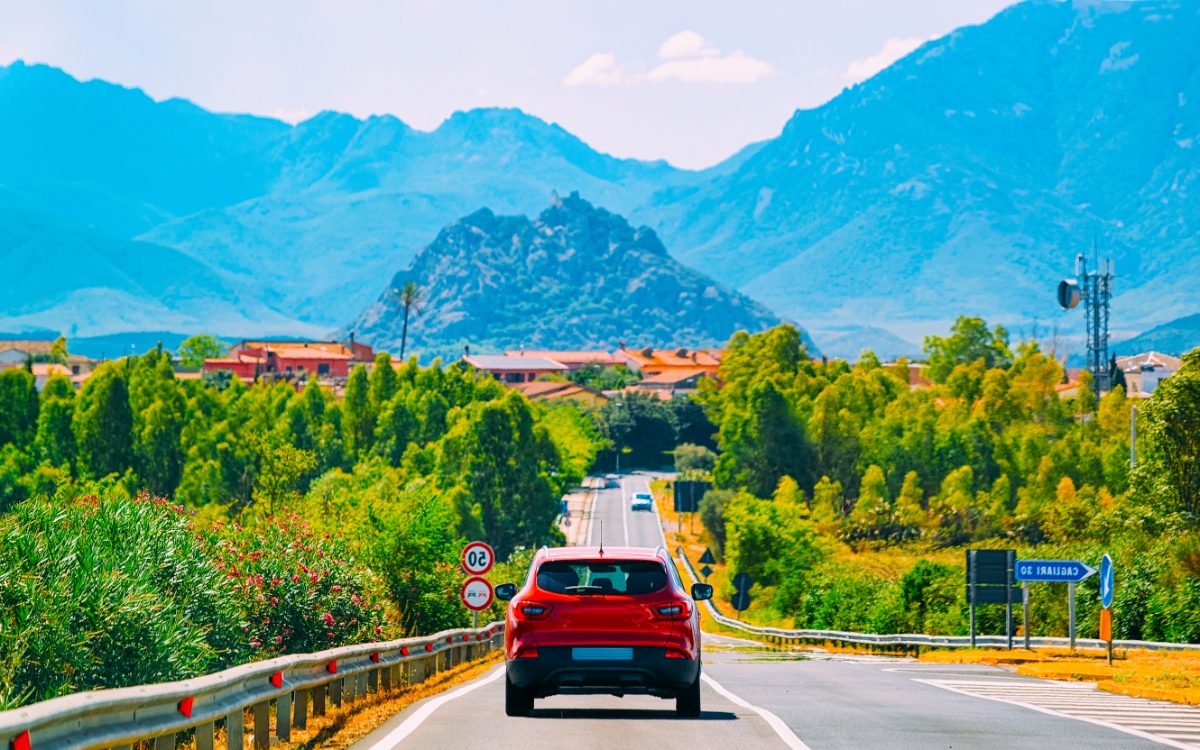 Car driving on a highway at Carbonia in Sardinia Island, Italy