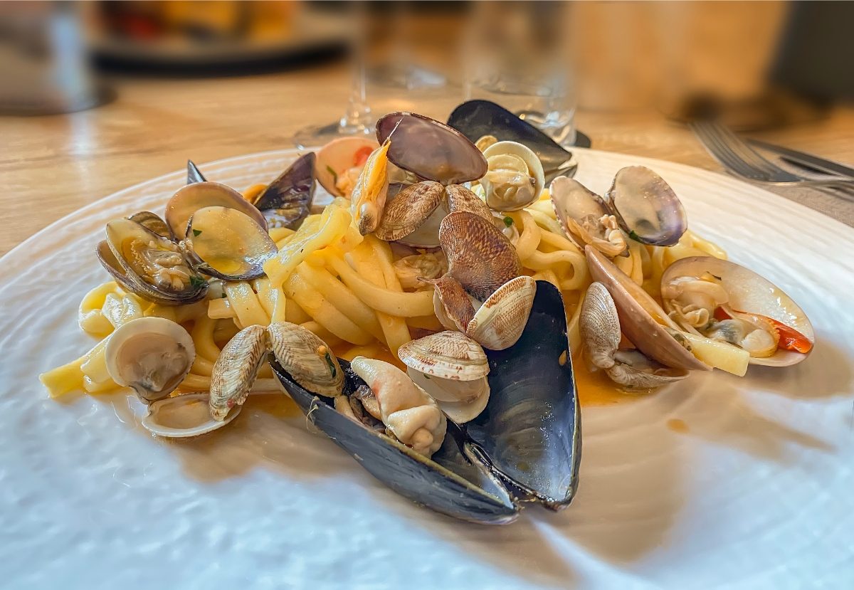 Close of the scialatielli pasta with clams, cockles and mussels Italian dish