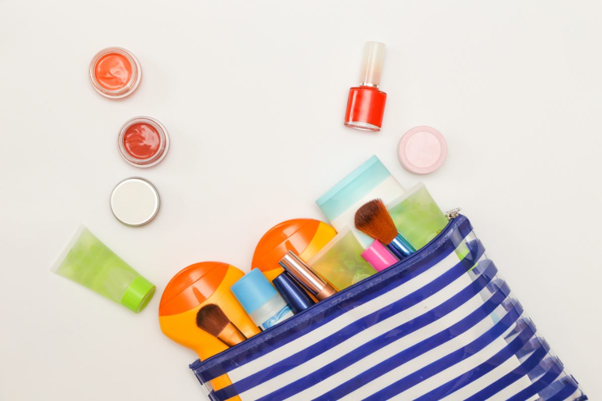 Top view of skincare and beauty cosmetic travel-sized products