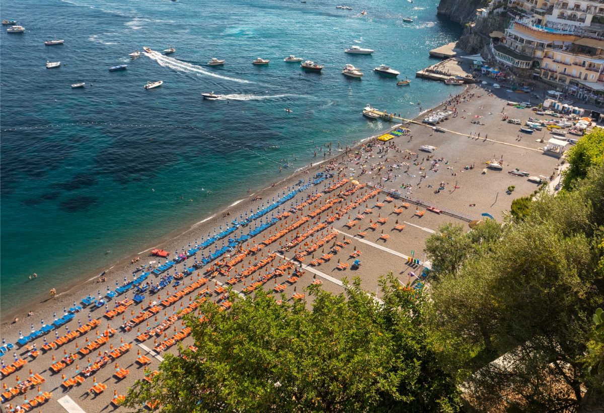 Aerial view of the Spiaggia Grande lively Positano beach in Amalfi Coast