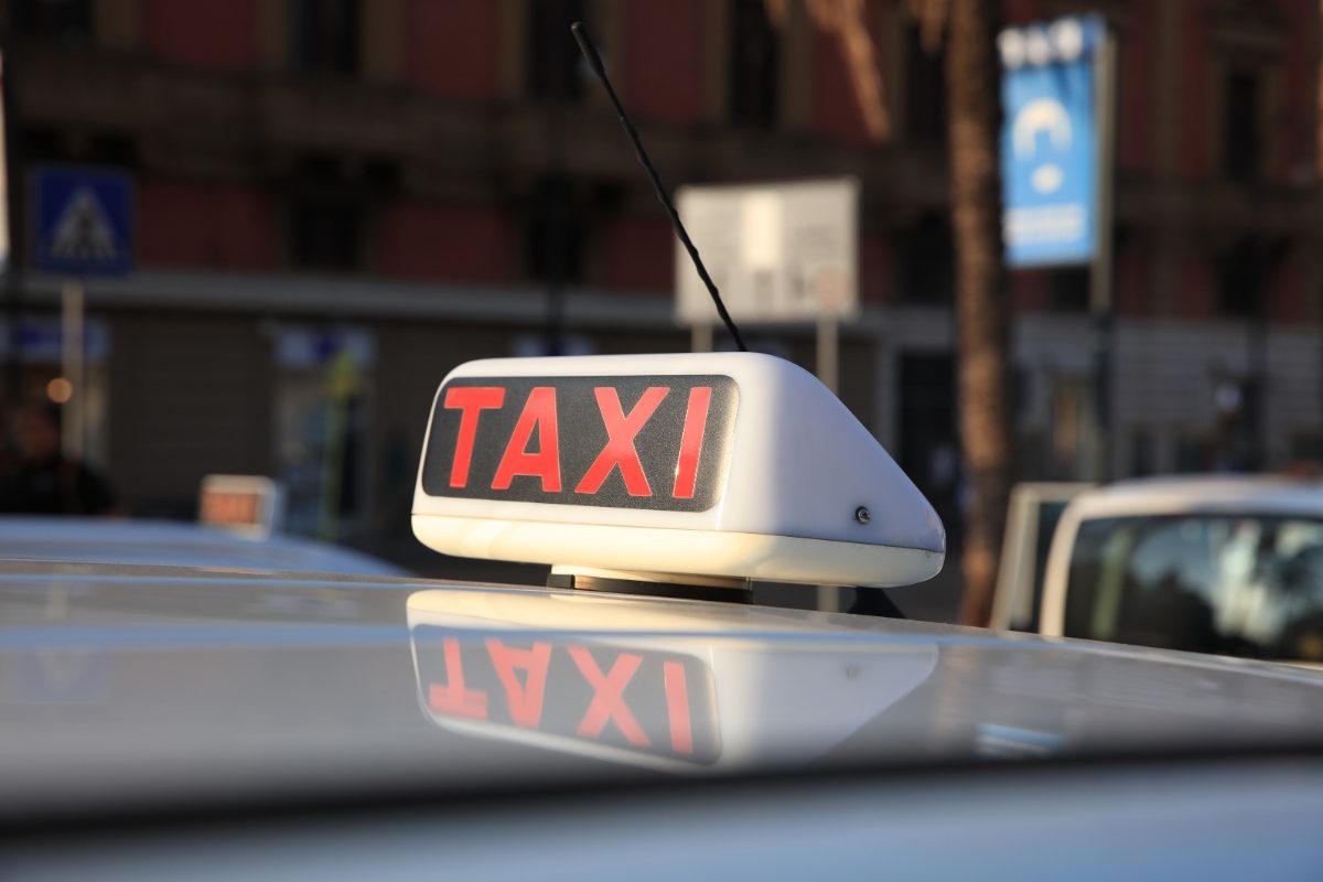 Close-up of a taxi sign in Palermo, Sicily, Italy