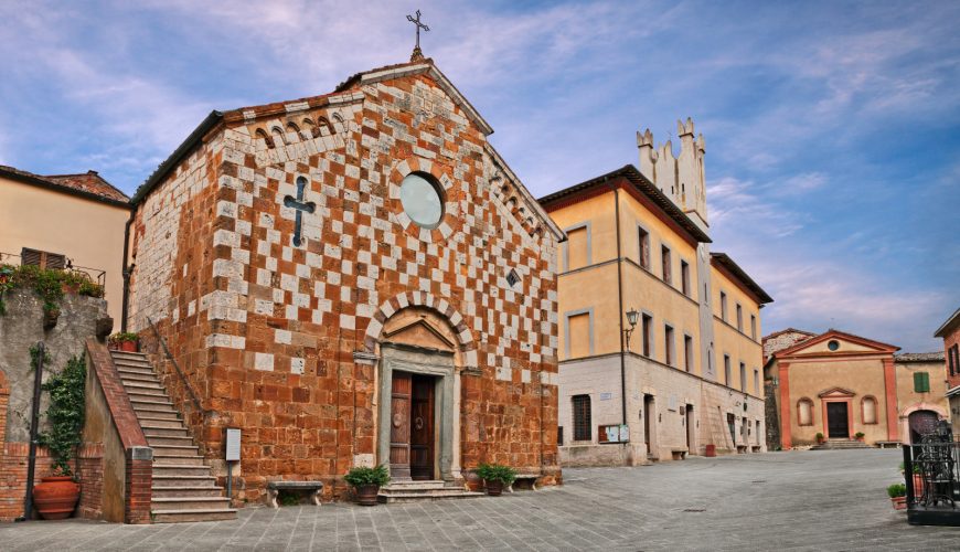 Medieval church and the view of the main square at Trequanda, Siena in Tuscany, Italy