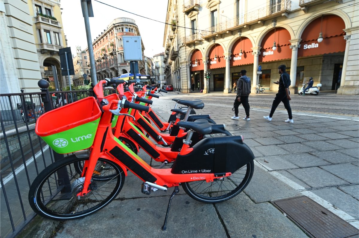 Close-up of Lime electric bike share service in Turin, Italy 