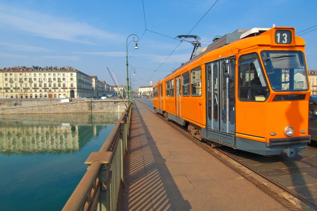 Close-up of a tram and skyline in Turin, Italy