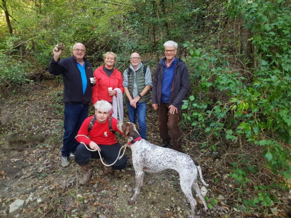 Group on a truffle hunting experience in Umbria, Italy