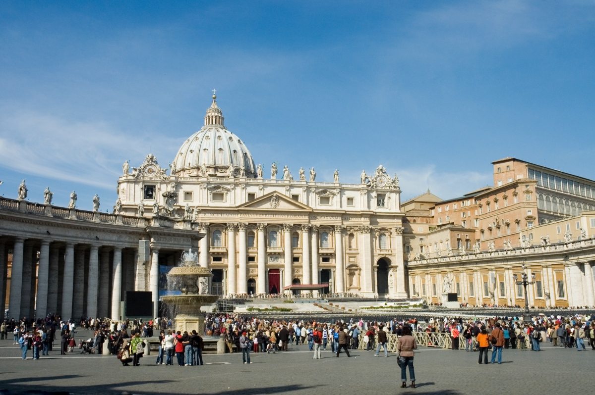 Panoramic view of tourists and locals exploring a tourists attraction in Vatican, Italy