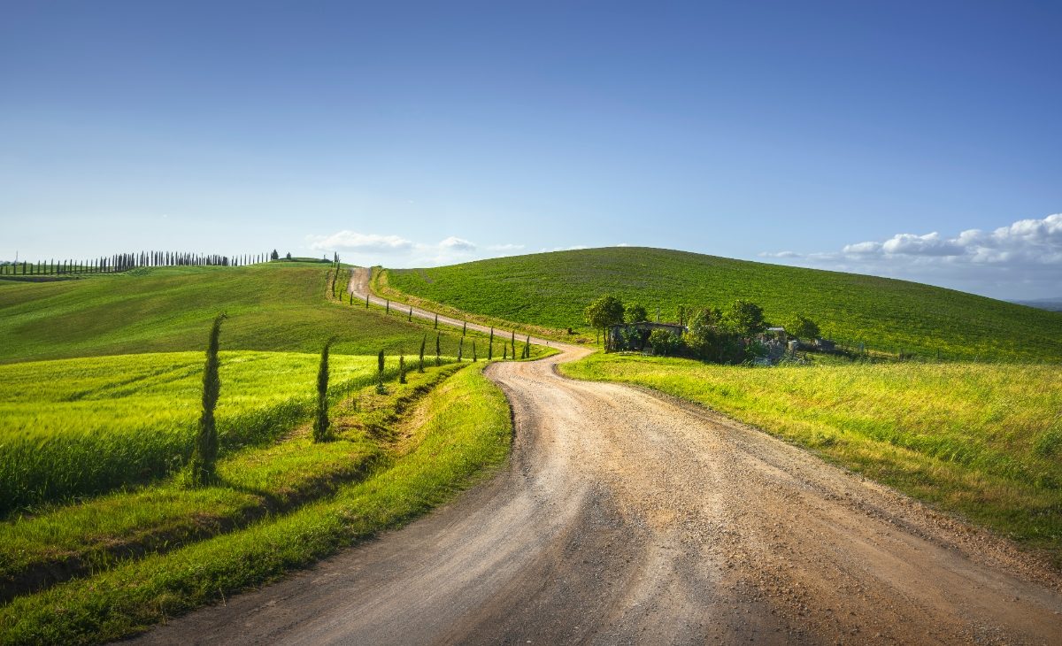 Scenic view of the Via Francigena route in Monteroni d'Arbia, Siena, showcasing the picturesque Tuscan landscape