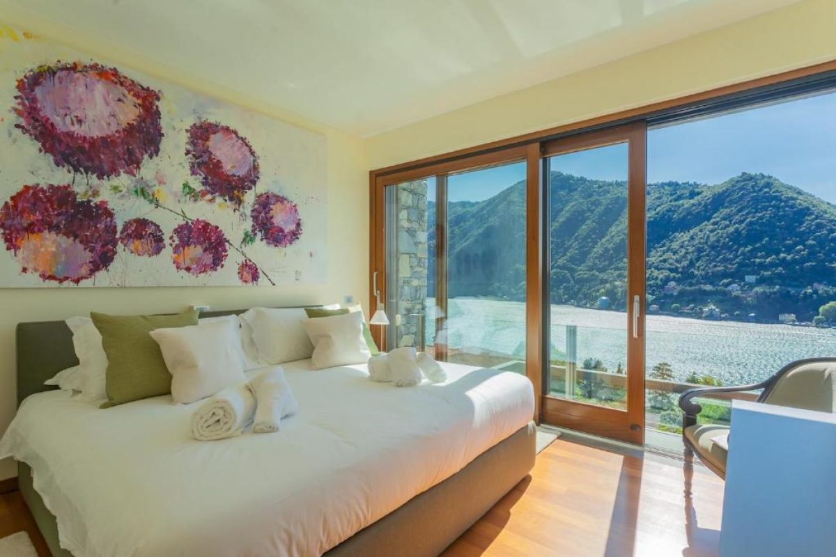 Bed Room interior of Villa Infinity Lake Como by Rent All Como with Infinity Pool View