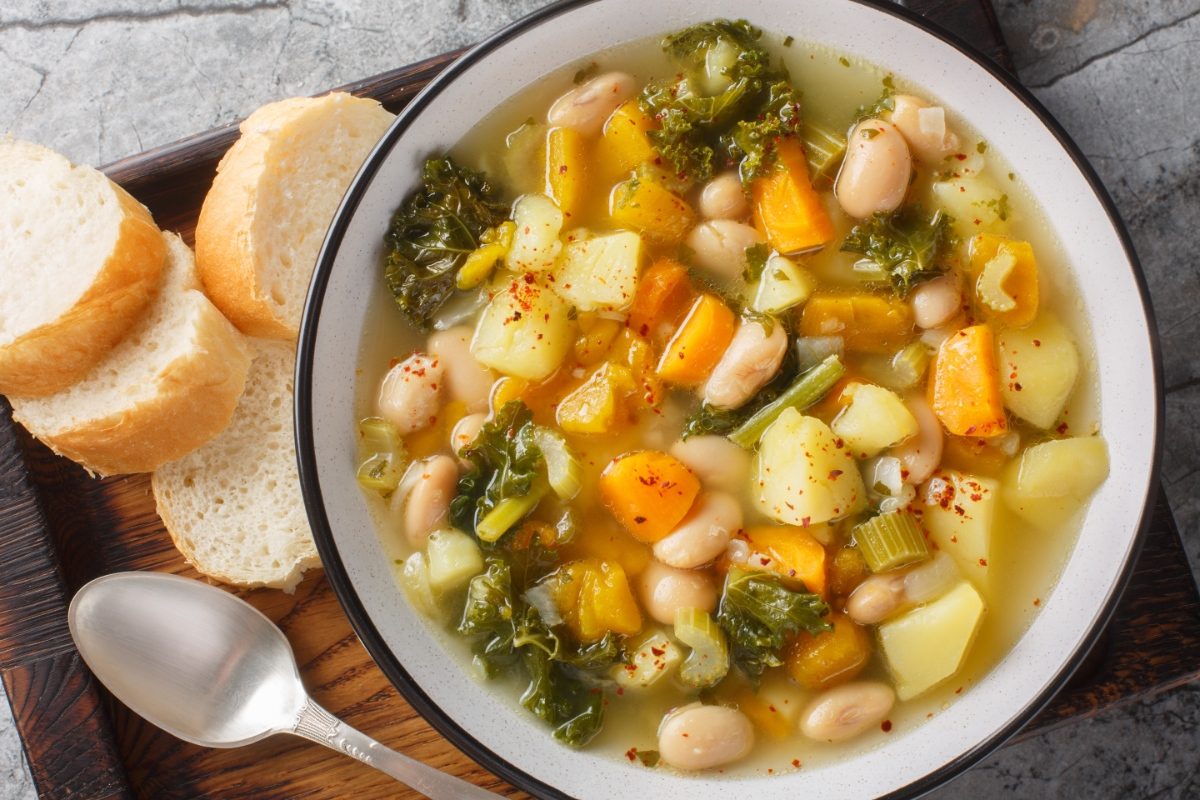 Close-up of the Zuppa alla Frantoiana Italian Bean and Vegetable Soup served on a bowl with a bread